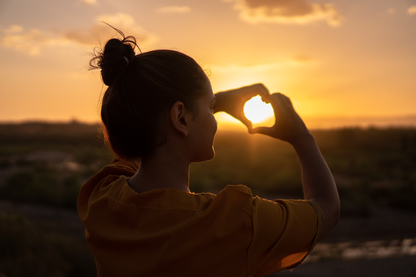 Woman Doing Hand Heart Sign